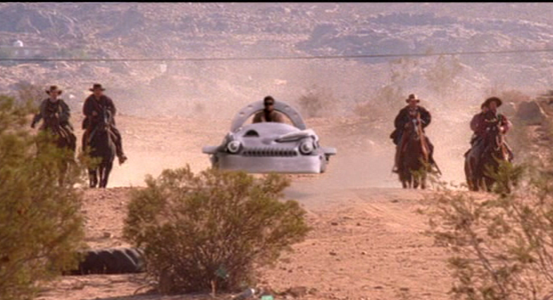 Hovercraft and horses in the space western series Firefly (2002-2003). In Firefly, humans terraform many extrasolar planets and moons following the Earth's destruction... all apparently in the image of the American West (© 2002 20th Century Fox / Mutant Enemy Productions, <a href="https://animalpeopleforum.org/beyondhuman/copyright-and-fair-use/">fair use</a>)