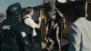In the movie District 9 (2009), a race of aliens come to Earth as refugees, where they are treated as second-class citizens subject to forcible relocation and other forms of abuse by humans (© 2009 TriStar Pictures, <a href="https://animalpeopleforum.org/beyondhuman/copyright-and-fair-use/">fair use</a>)