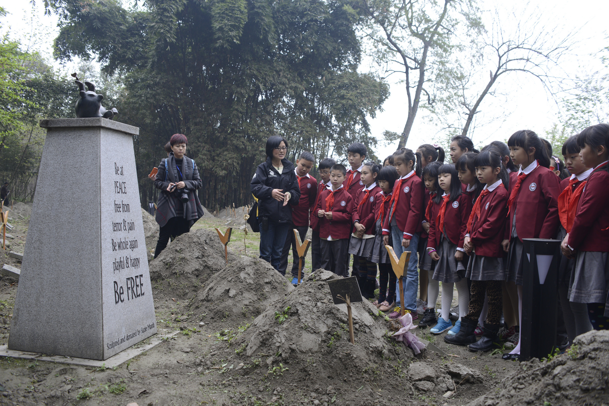 On Tomb Sweeping Day, a traditional Chinese holiday, schoolchildren pay their respects to deceased bears formerly farmed for bile, at Animals Asia's bear sanctuary in Chengdu (photo credit: Animals Asia, used under CC BY-NC 2.0)